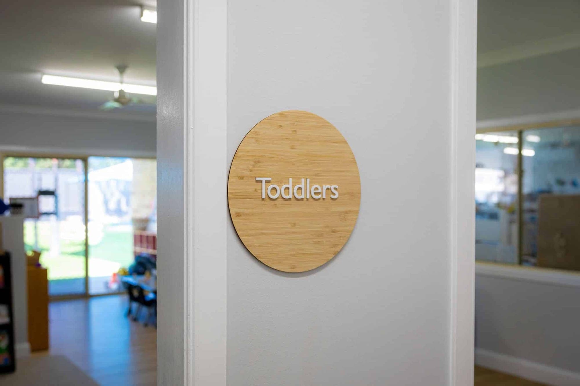 Timber Toddlers sign on the wall outside the toddler room